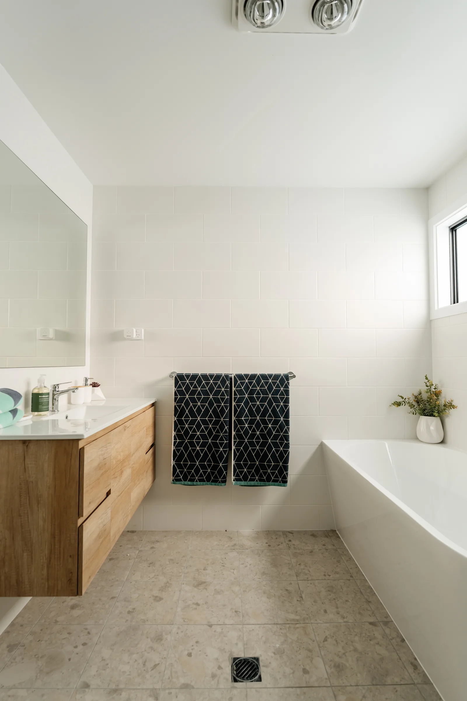Family bathroom with freestanding tub