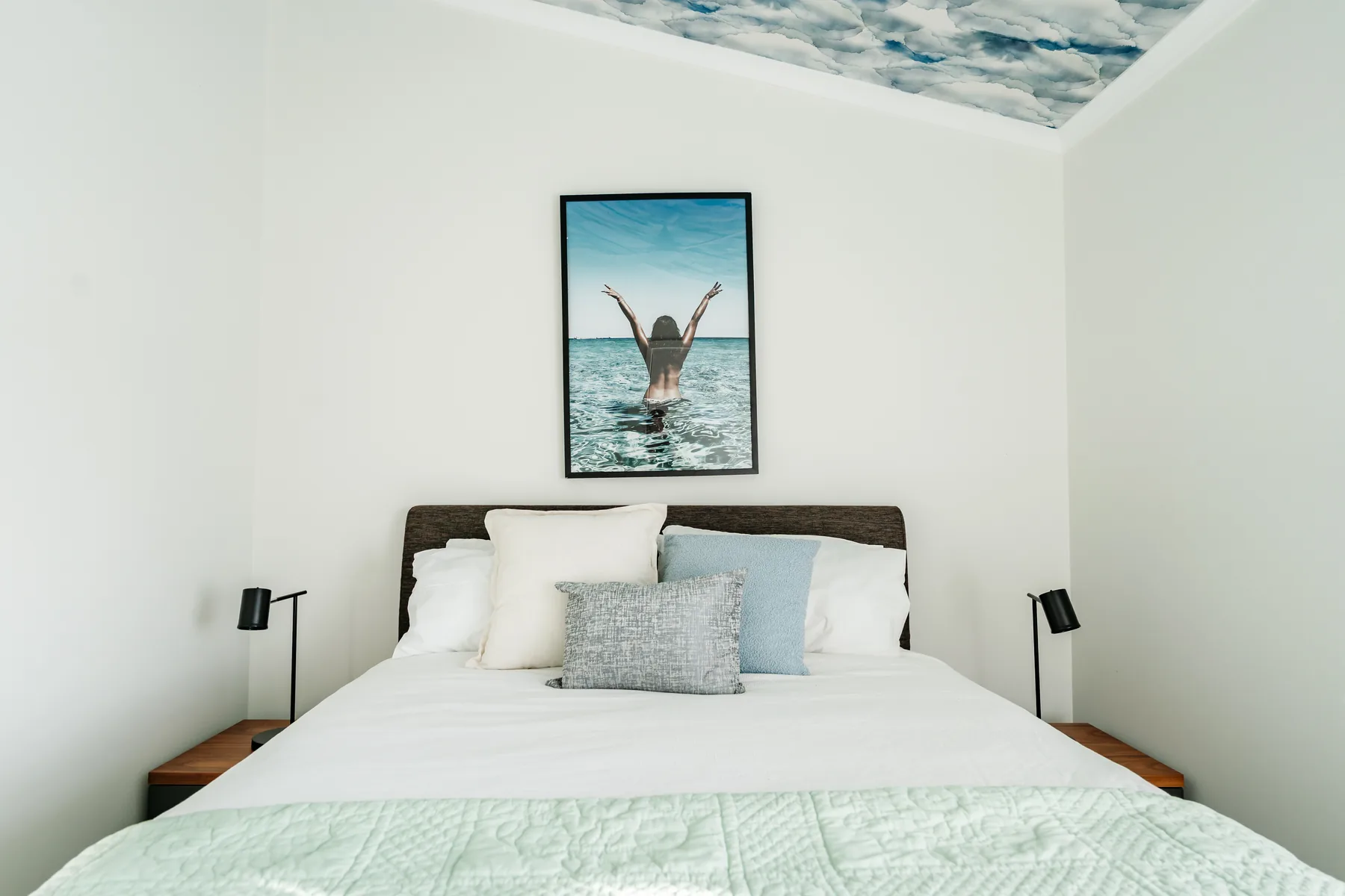 King bedroom with painted cloud ceiling